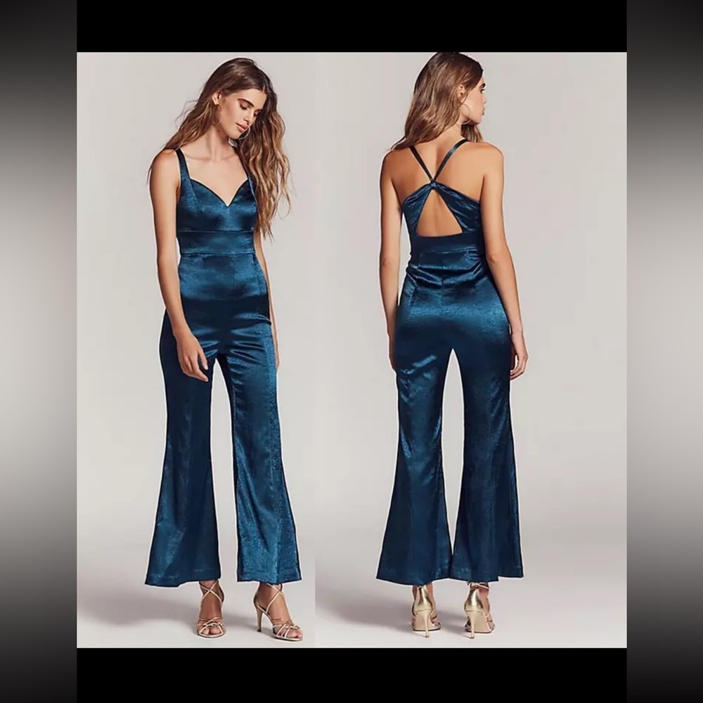 Free people emerald double straps bell bottom jumpsuit size 12.